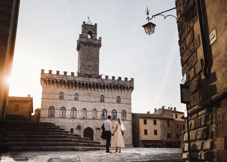 Italy Wedding Packages Cost All Inclusive, a wedding couple in a typical piazza in Italy