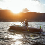 Villa Rusconi Clerici wedding Lake Maggiore, bride and groom on boat