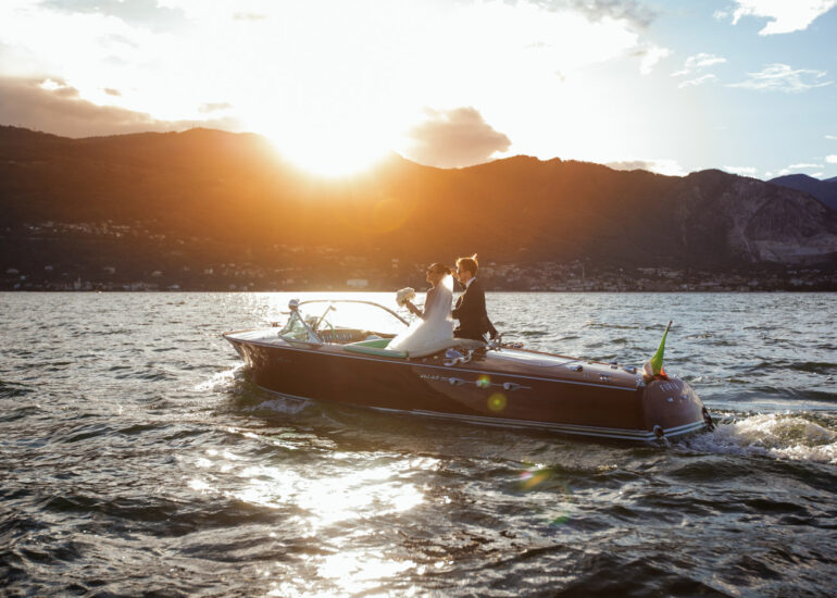 Villa Rusconi Clerici wedding Lake Maggiore, bride and groom on boat