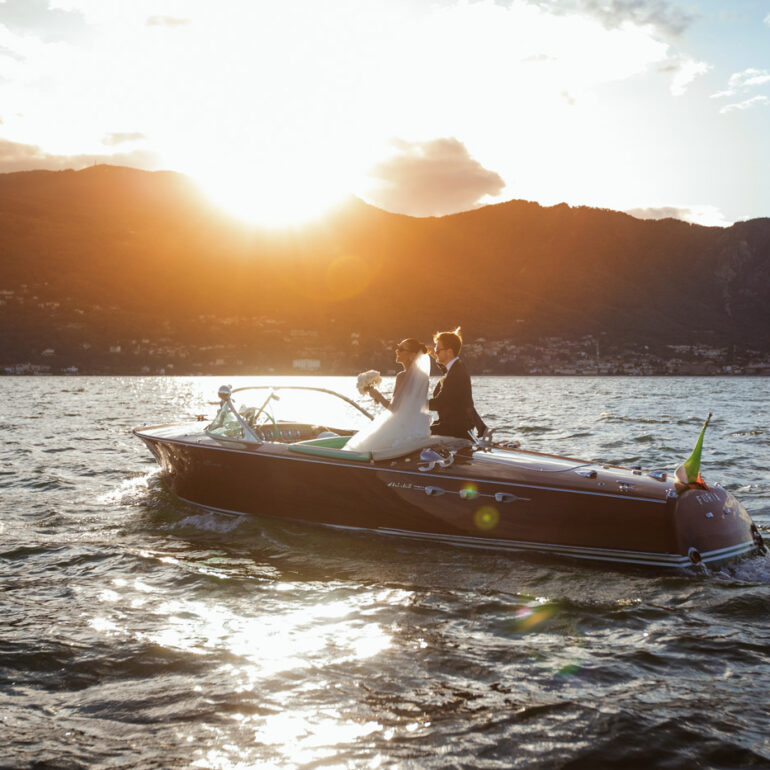 Villa Rusconi Clerici wedding Lake Maggiore, bride and groom on boat