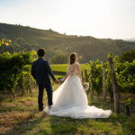 Bride and groom looking at the amazing Piedmont sunset in the Monferrato vineyards